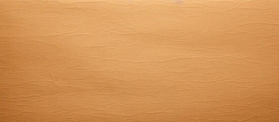 Poster - A yellowish brown paper background with a textured cut offering ample space for a copy space image