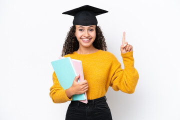 Wall Mural - Arab university graduate woman holding books isolated on white background pointing up a great idea