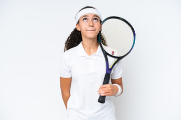 Canvas Print - Young tennis player woman isolated on white background and looking up