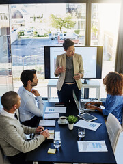 Poster - Business woman, coaching and discussion with team in meeting, presentation or conference at office. Female person or speaker talking to employees with paperwork, documents or screen at workplace