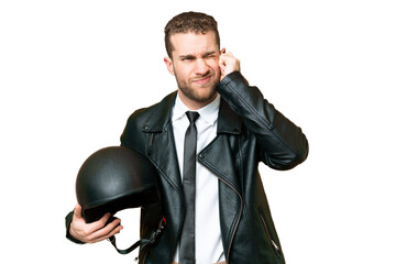 Wall Mural - Business man with a motorcycle helmet over isolated chroma key background frustrated and covering ears