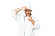 © luismolinero - Young blonde man Chef over isolated chroma key background focusing face. Framing symbol