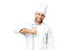 © luismolinero - Young blonde man Chef over isolated chroma key background giving a thumbs up gesture
