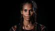 Portrait of indigenous Australian woman with black background