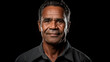 Portrait of indigenous Australian man with black background