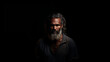 Portrait of indigenous Australian man with black background