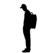 man in a cap and with a backpack silhouette on a white background vector