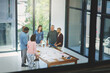 © peopleimages.com - People, architect and blueprint with team in meeting for planning, brainstorming or civil engineering at office. Group or contractors with documents or discussion on construction project at workplace