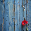 Memorial Day remembrance featuring a red poppy and dog tags on aged blue wood.
