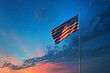 American flag on a blue twilight background, evoking Memorial Day honor.