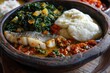 Closeup of Tanzanian Este Lunch: Ugali, Fish, and Greens - Traditional African Food