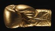 Detailed shot of a gold boxing glove against a black background