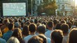 © Attasit - A diverse crowd gathering in a town square, united by their love for the game as they watch the match on a giant screen together