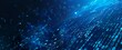 © qorqudlu - A high-tech image of binary code flowing in a blue digital data stream, representing the concept of information technology