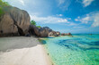 White sand and granite boulders in a tropical beach