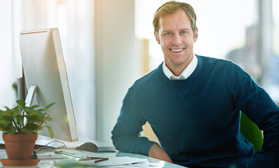 Portrait, happy man or computer for web design for programming, software update or development. Smile, news and confident programmer working on problem solving, information and solution in agency