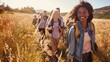 © ORG - A group of friends hiking together on a hot summer day. Group of friends walking through the countryside.