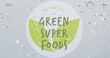 Image of green super foods text on circle on fruit falling into water background
