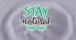 Image of stay natural text over water droplets on grey background