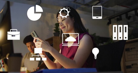 Poster - Image of computer application icons over asian businesswoman using smart phone in office