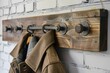 A coat rack with a coat hanging on it. Suitable for interior design concepts