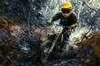 © Nam - Moscross racer rides through trail with yellow helmet and racing gloves