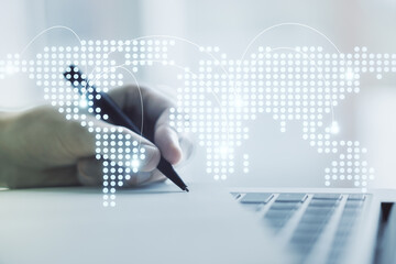 Wall Mural - abstract creative world map with connections and hand writing in notebook on background with laptop,