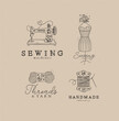 Sewing symbols machine, mannequin, wool, thread with lettering drawing in floral style on coffee color background