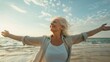 © Generative AI - Happy mature woman with arms outstretched feeling the breeze at beach Beautiful middle aged woman with arms up dancing on beach Mid lady feeling good and enjoying freedom at sea copy s : Generative AI