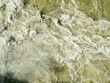 Abstract of water foam in the torrent of a river