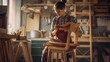 Young Woodworker Checking the Layout Manual of a Stylish Handmade Wooden Chair Talented Female Furniture Designer Working in a Workshop in a Creative Loft Space with Tools and Equipmen : Generative AI