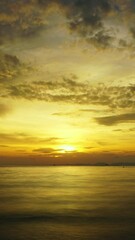 Wall Mural - beautiful landscape with tropical sea sunset on the beach, timelapse. vertical video 4k