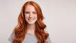 © Marko - young woman with long wavy red hair and freckles