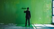 © Sagar - A man in a suit paints the wall green with a roller