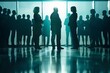 © furyon - silhouetted business people facing off tense corporate confrontation leadership clash and power struggle concept