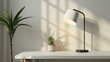 Minimalist desk lamp with a lampshade and blank wall mockup and sunlight