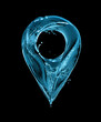 Location symbol made of water isolated on a black background. Water splashes in the shape of a location point