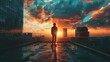 © Jesse - A silhouette of a person stands on a rooftop terrace gazing at a dramatic sunset. The sky is streaked with orange, red, and blue colors, suggesting either early morning or late afternoon. Reflections