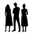 Vector silhouettes of  man and a  two young attractive slender women, a group of standing business people, profile, black  color isolated on white  background