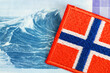 Norwegian krone exchange rate, Embroidered flag on the background of storm wave, 1000 kroner banknote, Norway money, Financial business concept