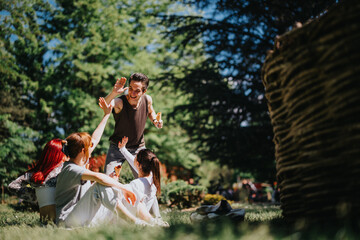 Sticker - A group of young adults playfully engaging with each other in a park, sharing joy and friendship under the sun.