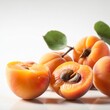Apricot fruits on white background.