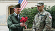 Soldier Donates Flowers To The General In Gratitude For His Service Offered