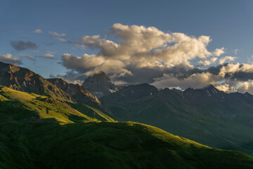 Wall Mural - sunset in mountains and clouds