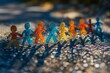 Colorful Paper Chain Figures Holding Hands on Sparkling Ground
