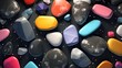 A background of various colored minerals. Abstract composition of rounded multicolored stones on a flat surface.