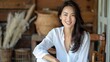 © AIArtistry - Relax And Unwind With An Attractive Casual Asian Woman, Her Smile Radiant As She Sits On A Wooden Chair, Enjoying A Moment Of Tranquility