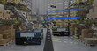 Image of screen with data processing over warehouse