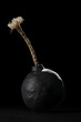 Round black bomb with fuse. Symbolizing fear, crisis, or dangerous violence.