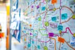 © Dusit - A white board with a lot of colorful sticky notes on it.